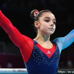 Home 23 나디아 콤네치 운동 경력 - A young female gymnast performing a flawless uneven bars routine in an Olympic arena, wearing a slee...